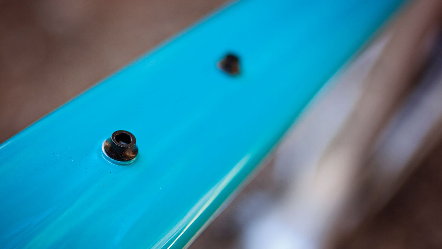 Salsa Cutthroat Carbon Force 1 bike downtube close-up of water bottle mounts