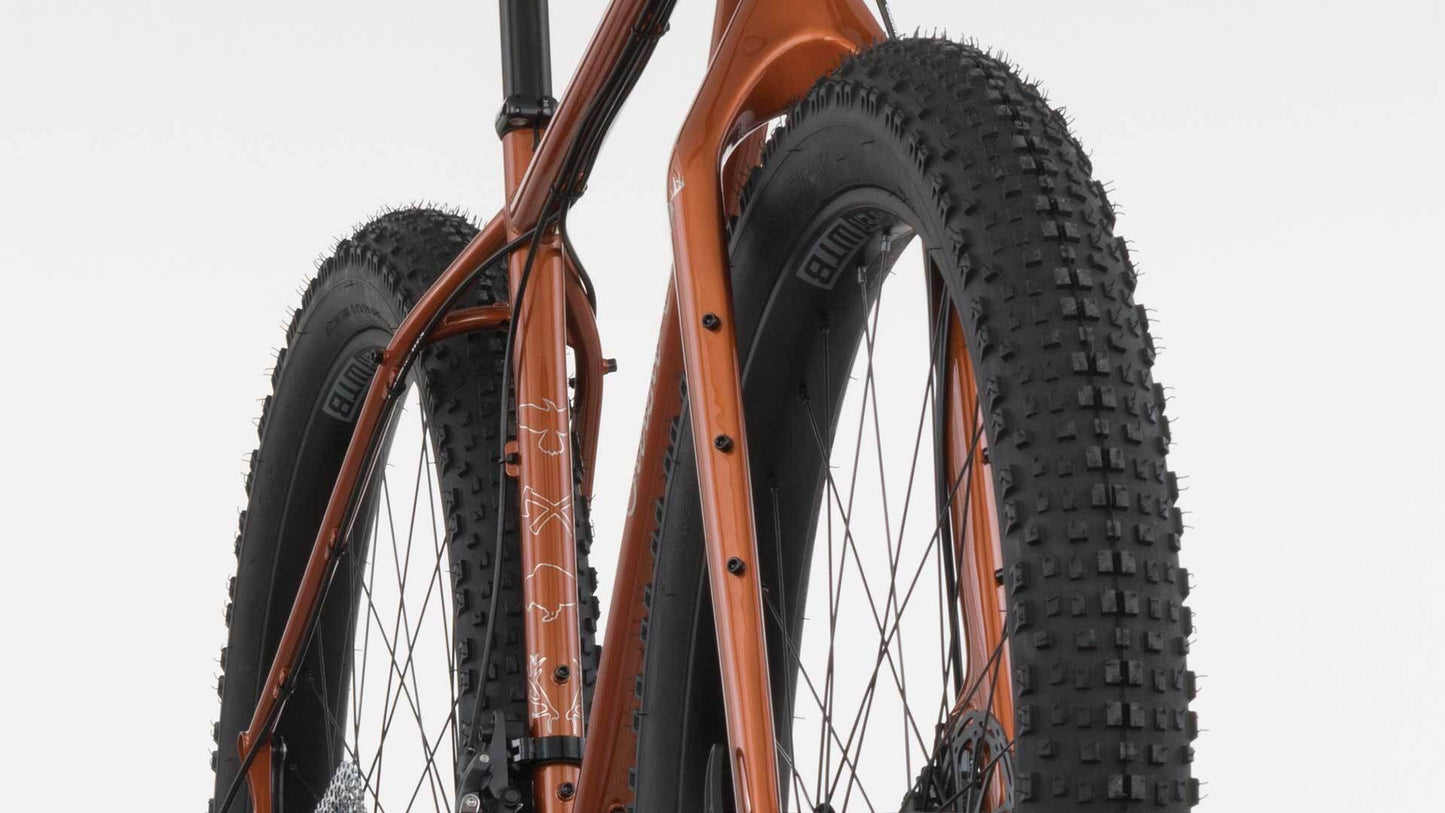 Salsa Deadwood steel 29-plus bike copper color front three-quarter view tire focus