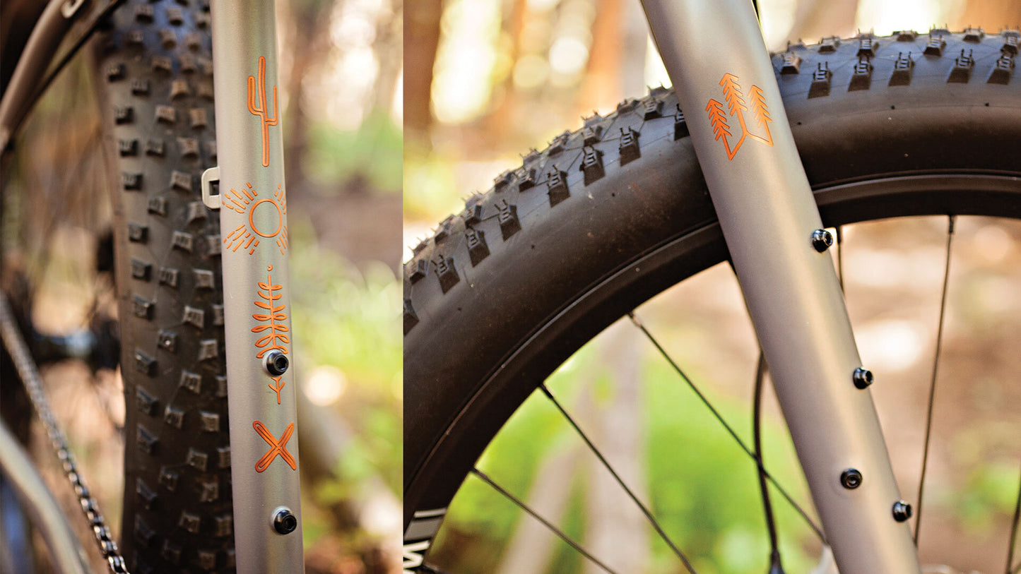 Salsa Fargo 27.5 Plus Rival bike split image showing fork and seat tube decals