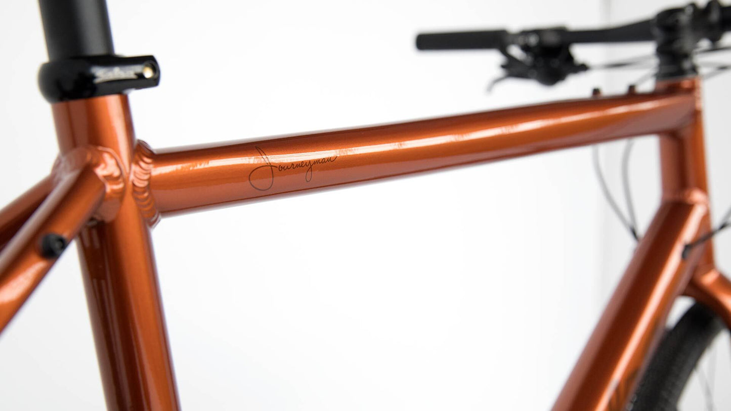 Salsa Journeyman Flat Bar Claris 700c bike copper color top tube and seat tube focus