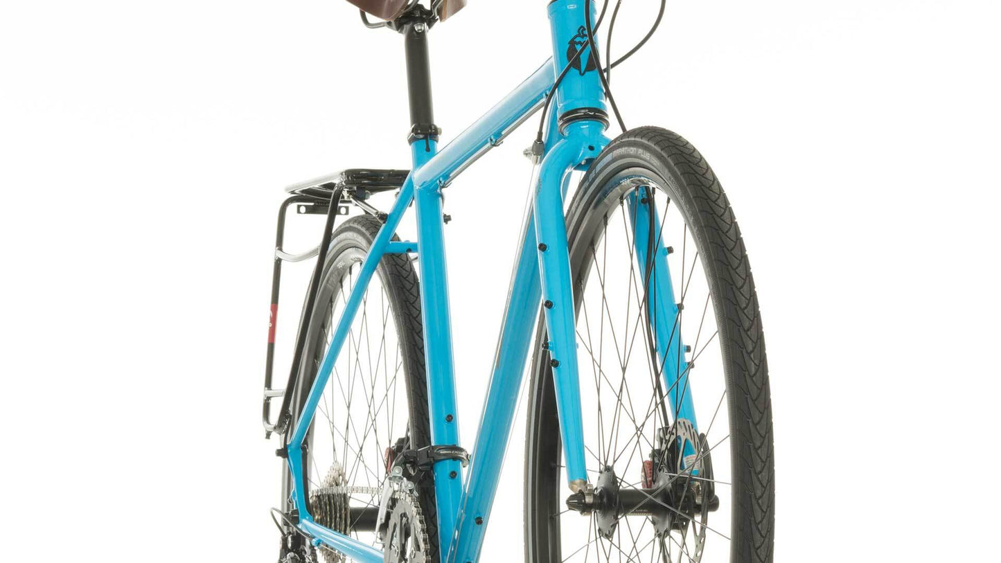 Salsa Marrakesh Flat Bar Deore bike blue color three-quarter view fork focus