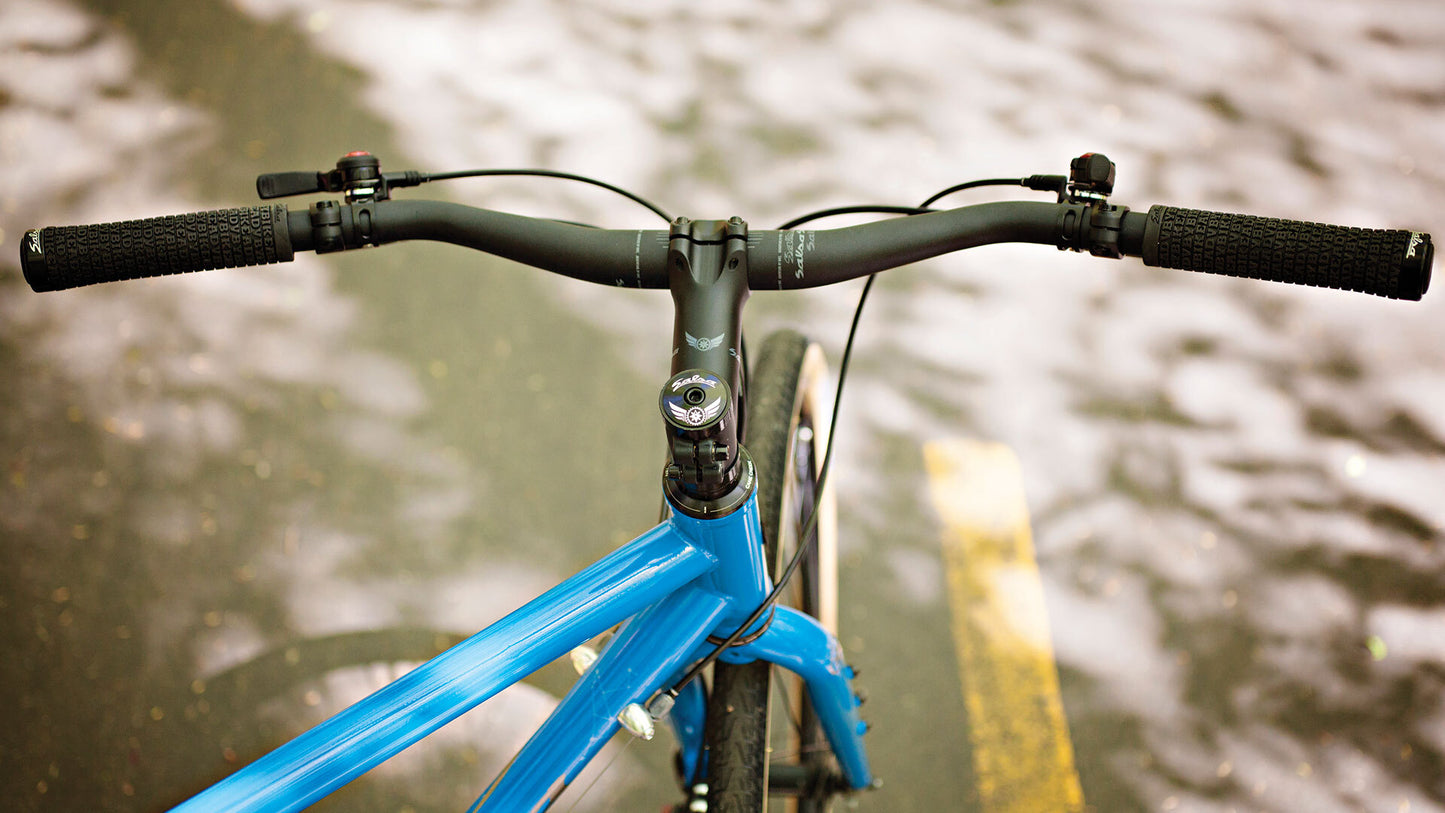 Salsa Marrakesh Deore Flat Bar bike blue color handlebar and stem area focus