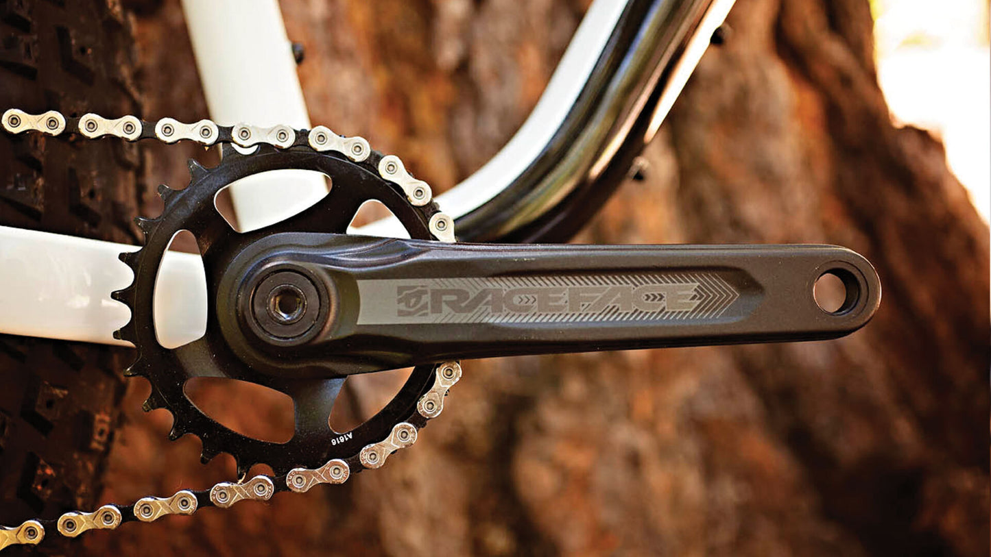 Salsa Mukluk NX1 SUS bike white and black color crankset close-up