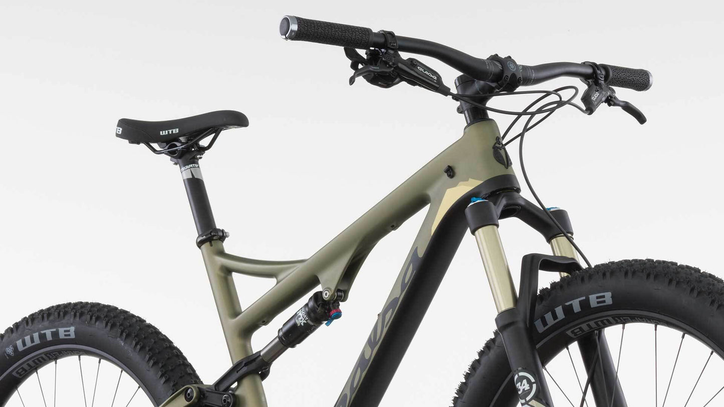 Salsa Pony Rustler Carbon GX1 bike green color front three-quarter view top of bike focus