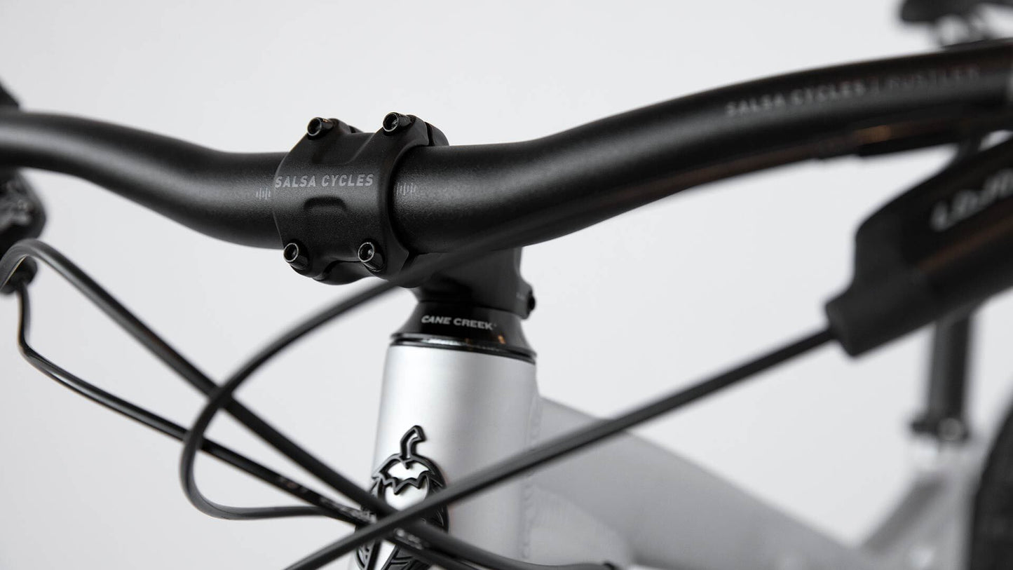 Salsa Pony Rustler bike silver color handlebar and stem area focus