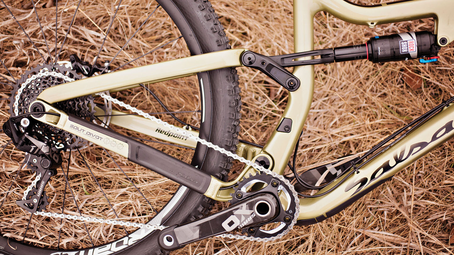 Salsa Redpoint Carbon XO1 bike gold color side view rear shock and linkage focus