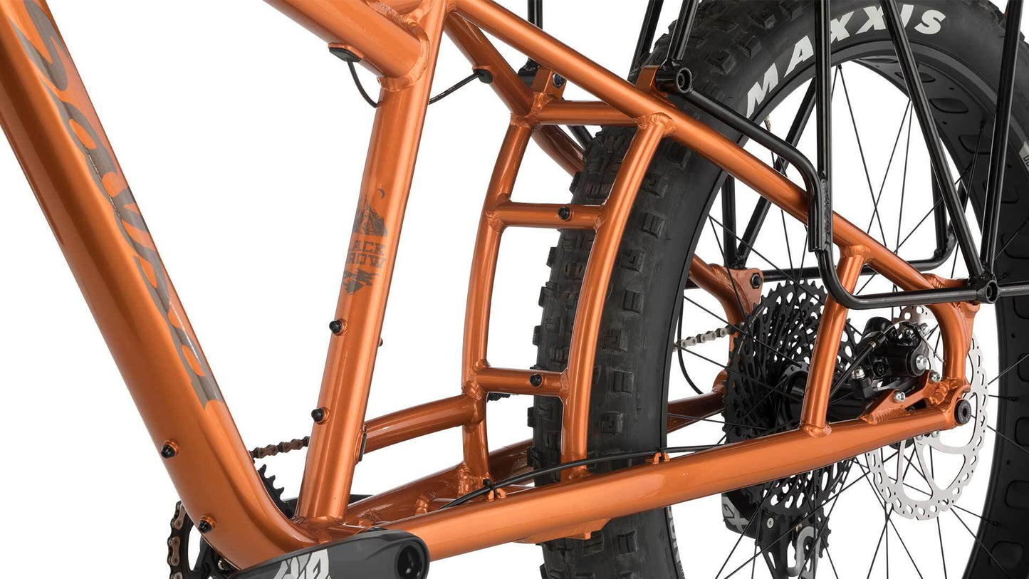 Salsa Blackborow GX Eagle cargo fat bike orange color rear three-quarter view focus on chainstay area