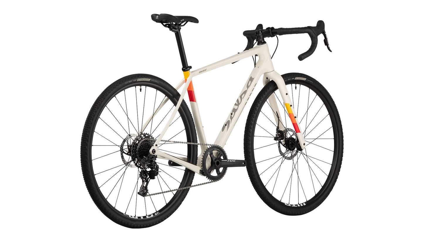 Warbird Carbon Apex 1 bike tan color rear three-quarter view