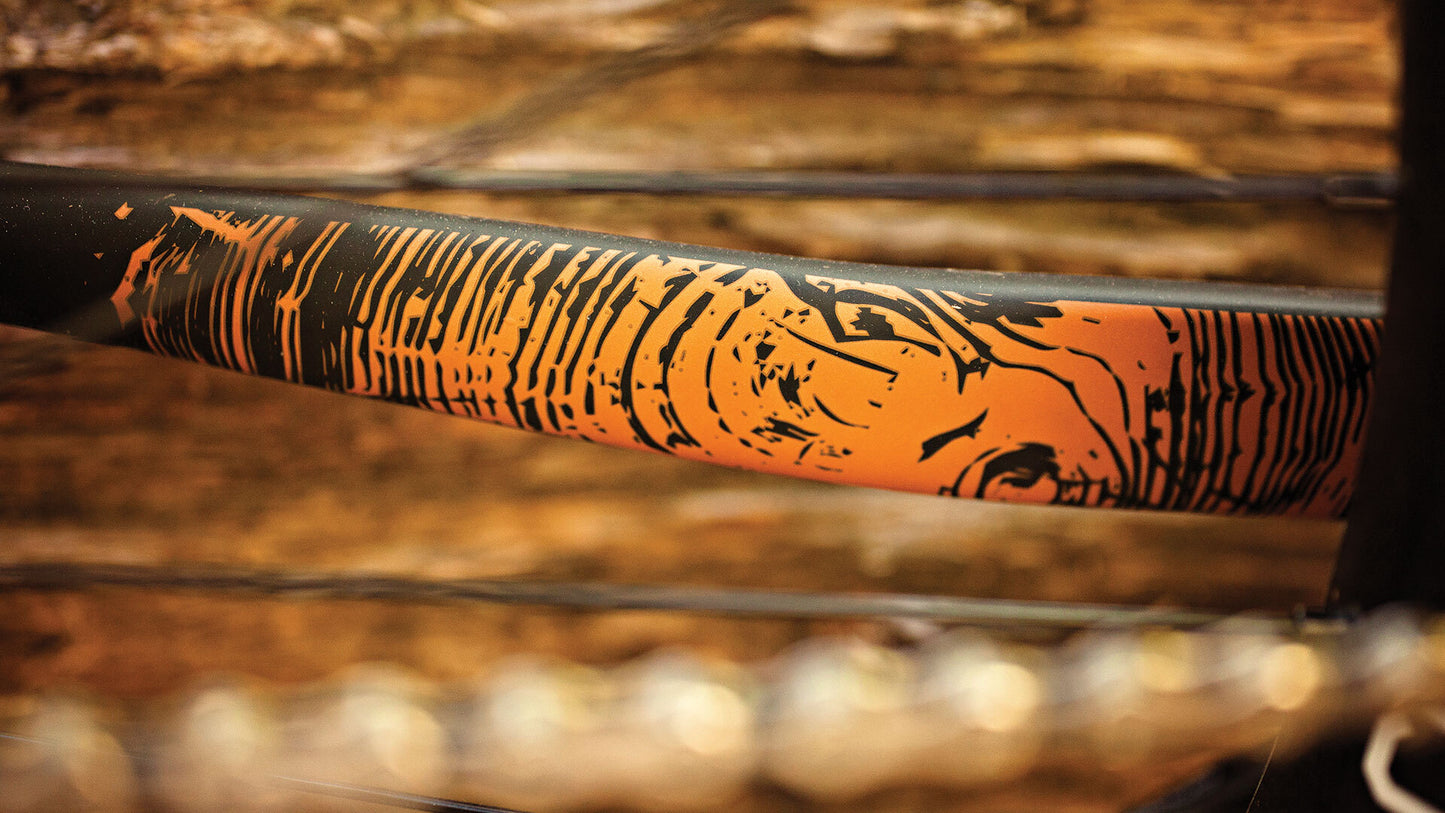 Decorative object with tiger design on a wooden background