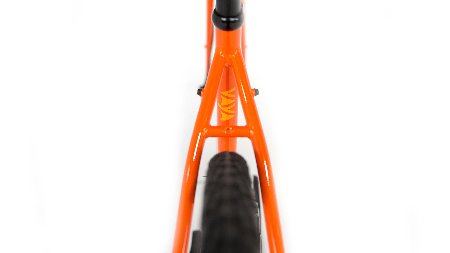Close-up of an orange bicycle frame on a white background