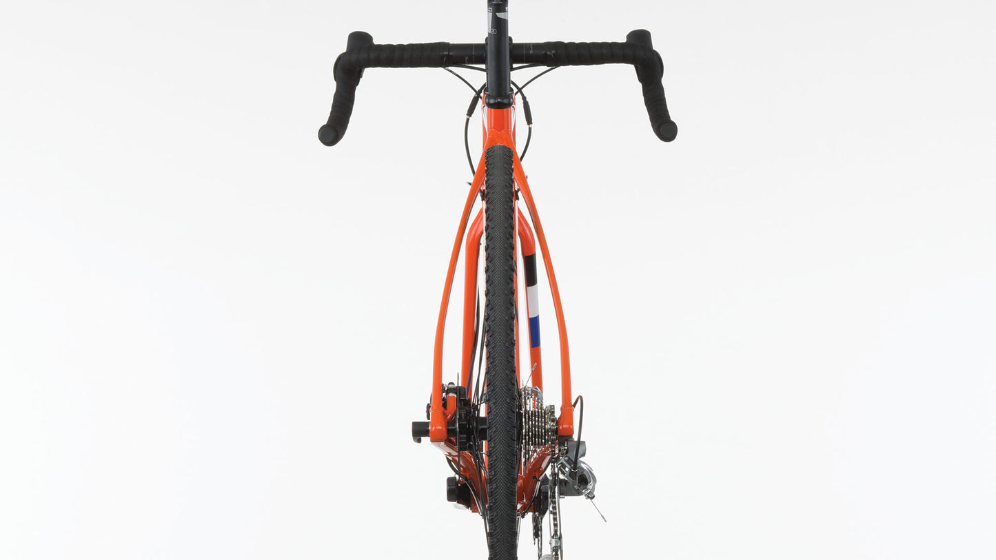 Salsa Warbird Tiagra bike orange color view from back