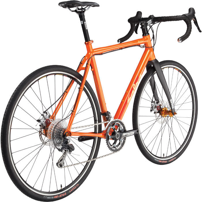 Salsa Warbird bike orange color rear three-quarter view