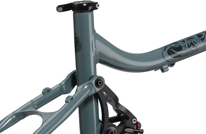 Salsa El Kaboing frame gray color top of swing arm, link, and seat tube area focus
