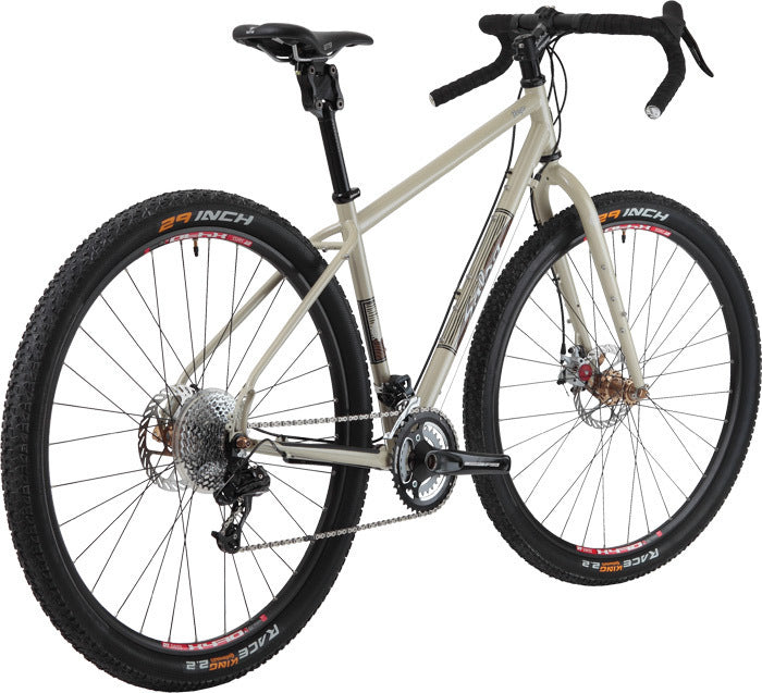 Salsa Fargo bike cream color rear three-quarter view