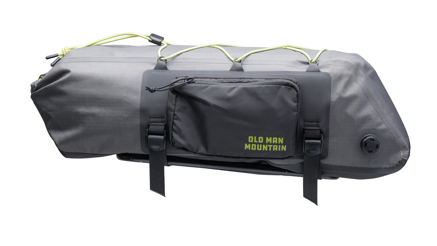 Gray Old Man Mountain Atlas Rack Pack with black straps and 'Old Man Mountain' branding