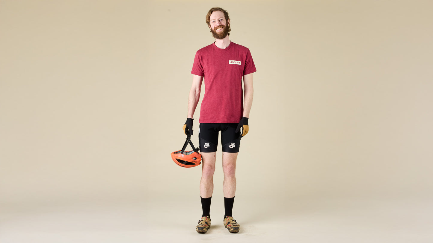 Male model faces the front while wearing the Salsa logo t-shirt in red