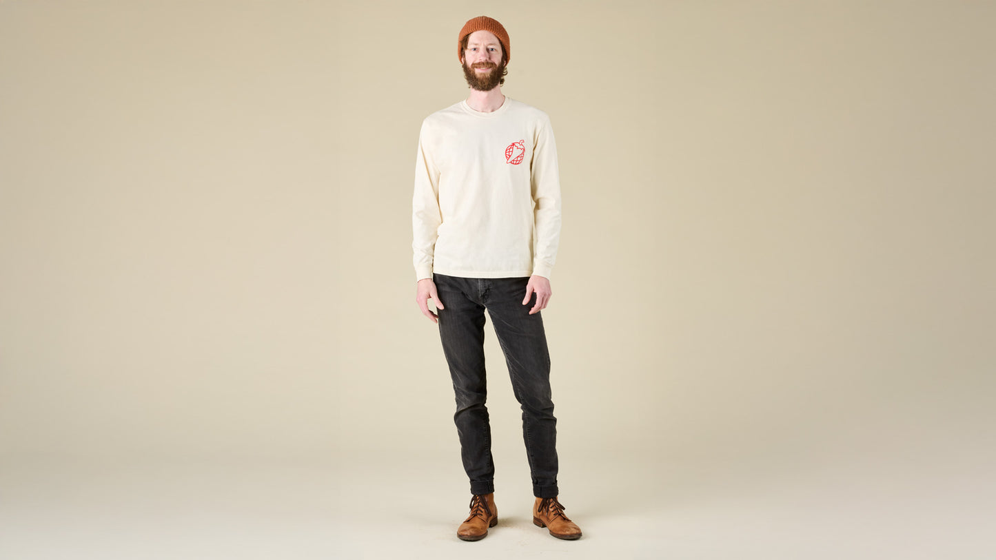 Male model faces the front while wearing the Salsa logo longsleeve t-shirt in white