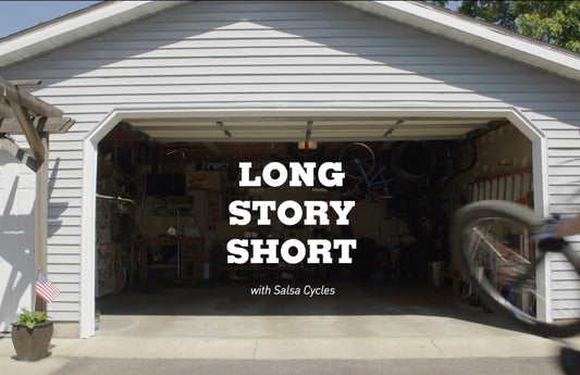 A view into someone's garage with the door fully open. The title "Long Story Short" is in the center.