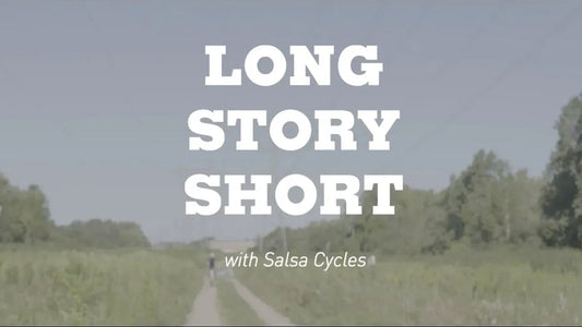 A gravel trail in a prairie with blue skies above. The title "Long Story Short" is in the center.