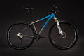 Salsa El Mariach Ti bike blue and raw titanium color side view