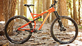 Salsa Horsethief GX1 bike orange color side view outside in forest