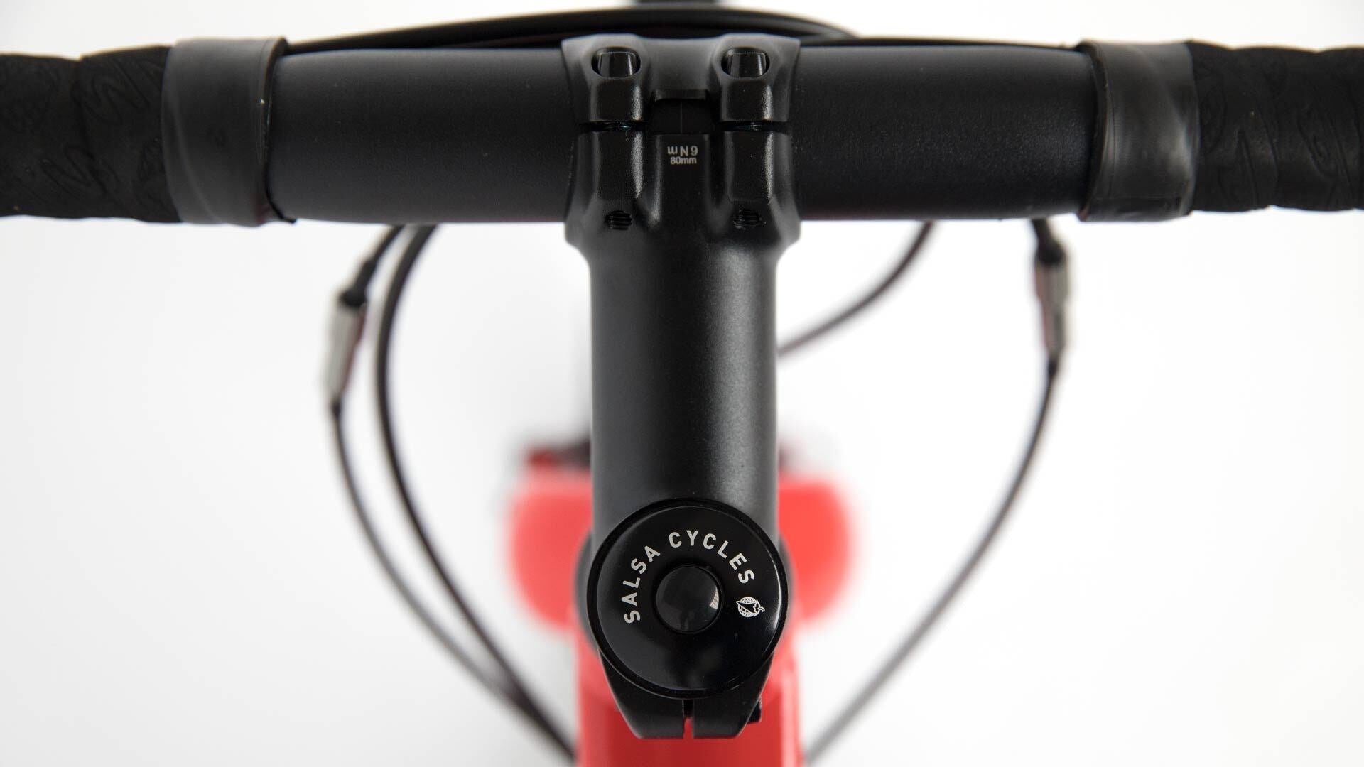 Salsa Journeyman 700c Claris bike orange color stem and top cap close-up