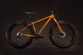 Salsa Mukluk 2 bike orange color side view