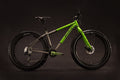 Salsa Mukluk Ti bike half green color side view 