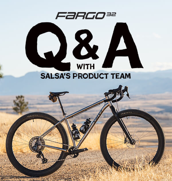 A Salsa Fargo 32 bike is shown outdoors in a dry grassy landscape with large overlaid text reading 'Fargo 32 Q&A with Salsa's Product Team.' The bike frame appears metallic silver/gray, with black components and tires.