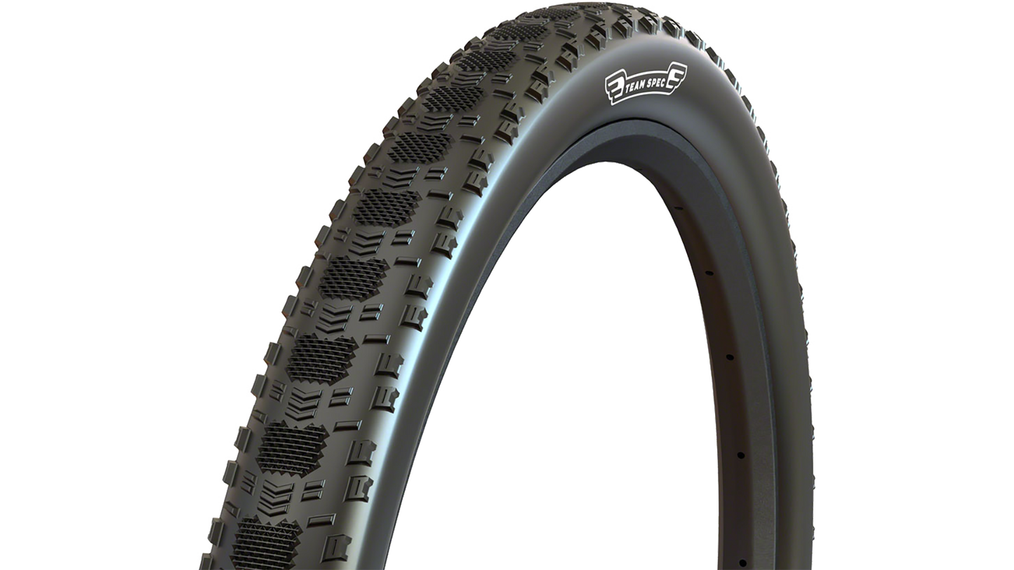 A Maxxis Aspen ST bicycle tire shown upright against a plain white background, with visible sidewall branding that says "Team Spec"