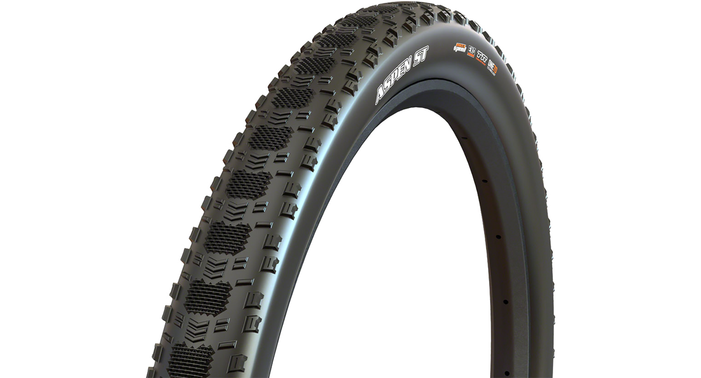 A Maxxis Aspen ST bicycle tire shown upright against a plain white background, with visible sidewall branding 