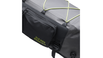Closeup of zipper pouch on bag with 'Old Man Mountain' branding