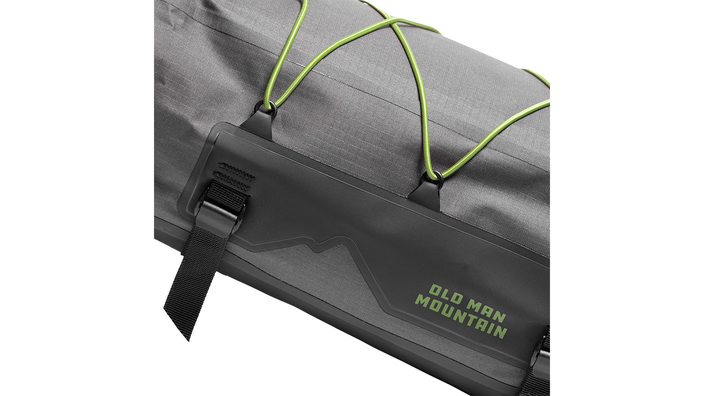 Old Man Mountain Atlas Rack Bag - Side detail view with "old man mountain" branding.