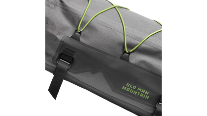 Old Man Mountain Atlas Rack Bag - Side detail view with "old man mountain" branding.