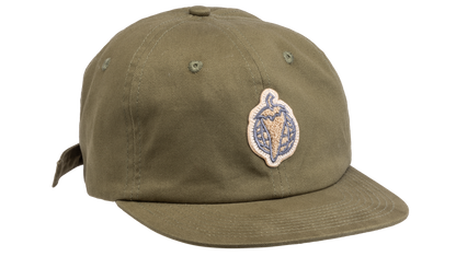 An olive green flat-brim baseball cap featuring a circular embroidered patch on the front with a pepper