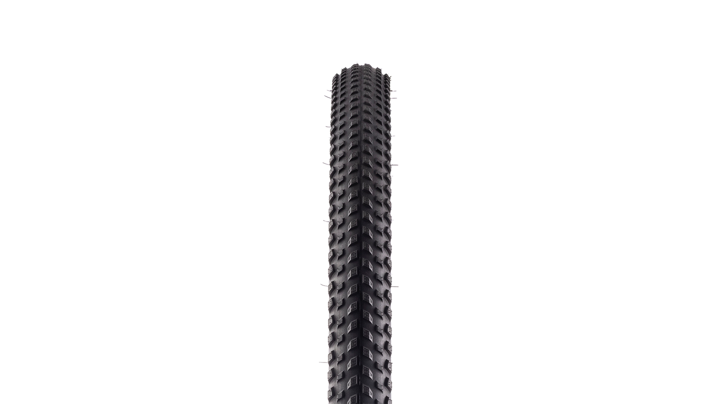 A single black bicycle tire shown vertically against a plain white background.
