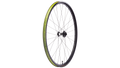 A single bicycle wheel with a black rim, black hub, and thin silver spokes, featuring a yellow-green tubeless tape strip along the outer edge, shown against a plain white background.