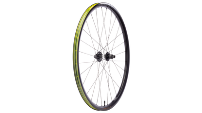A single bicycle wheel with a black rim, black hub, and yellow-green tubeless tape, shown against a plain white background.